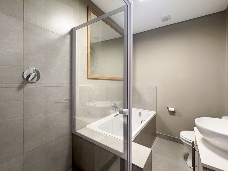 2 Bedroom + 2 Bath |  Top-Floor Coastal Sophistication with Panoramic Lagoon Views - Photo 10