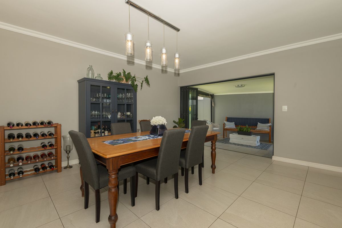 Located in secure Calypso Beach Estate, this spacious home is designed with family living in mind. - Photo 4