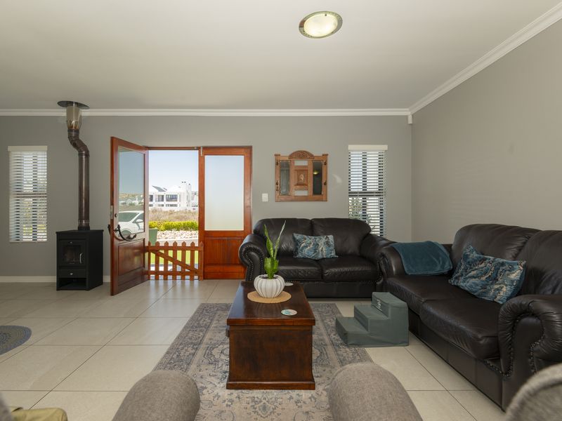 Located in secure Calypso Beach Estate, this spacious home is designed with family living in mind. - Photo 6