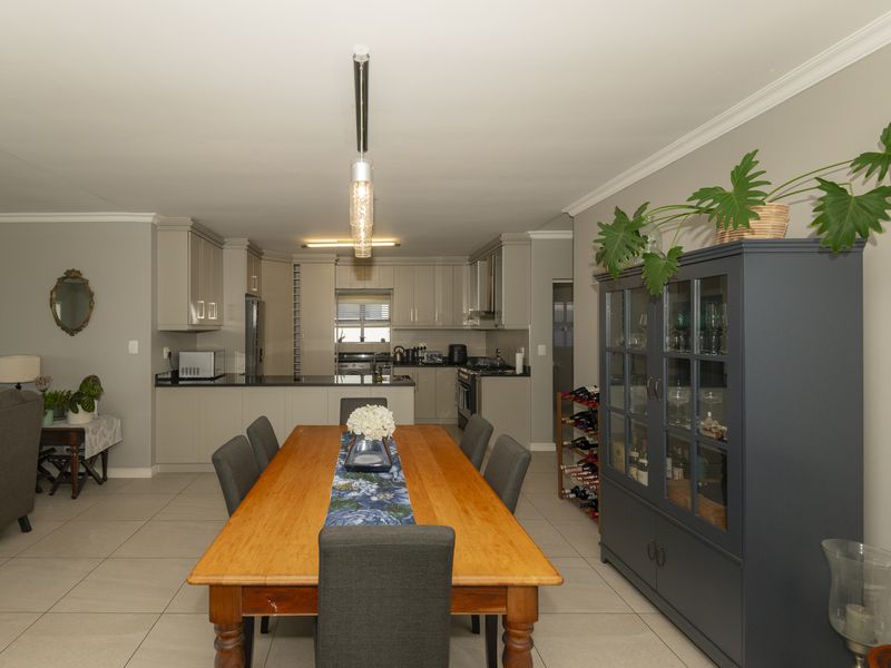 Located in secure Calypso Beach Estate, this spacious home is designed with family living in mind. - Photo 5