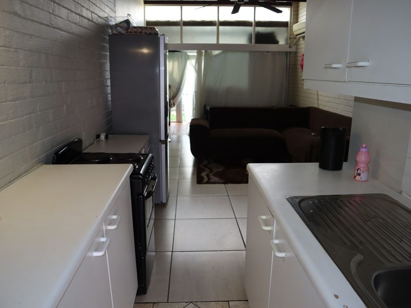 WHY RENT WHEN YOU CAN OWN THIS AFFORDABLE 1 BED SIMPLEX - Photo 4