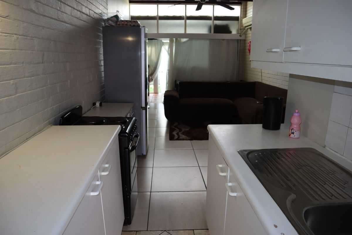 WHY RENT WHEN YOU CAN OWN THIS AFFORDABLE 1 BED SIMPLEX - Photo 4