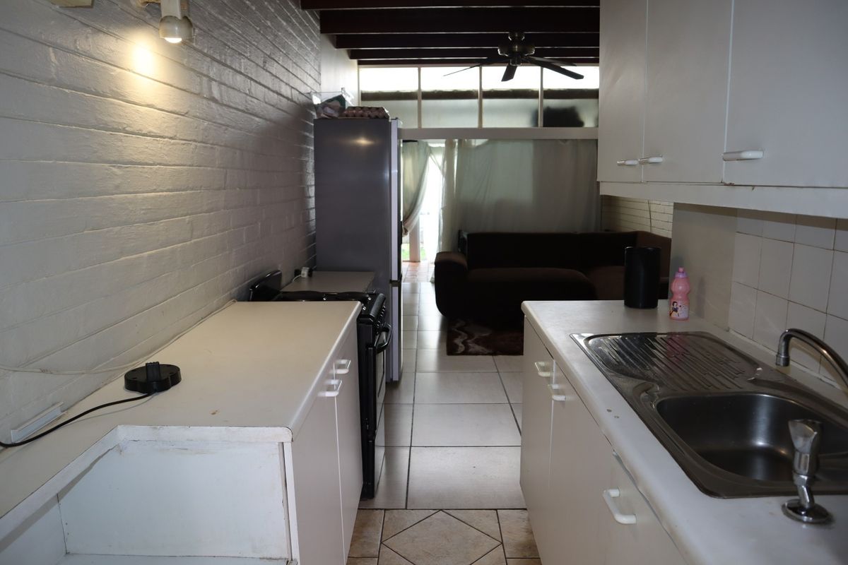 WHY RENT WHEN YOU CAN OWN THIS AFFORDABLE 1 BED SIMPLEX - Photo 3