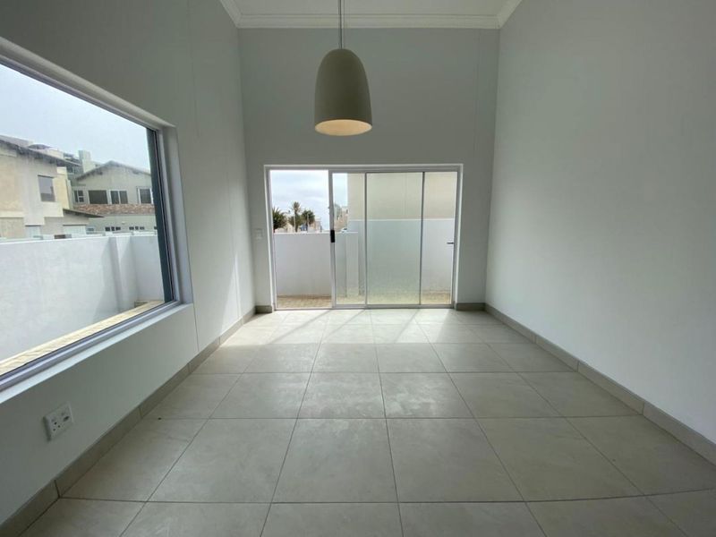 Coastal Bliss Awaits: Stunning Brand-New Family Home - Photo 6