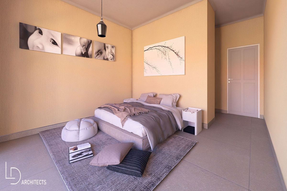 A modern bedroom featuring neutral textured walls, large format floor tiles, and a minimalist interior design.