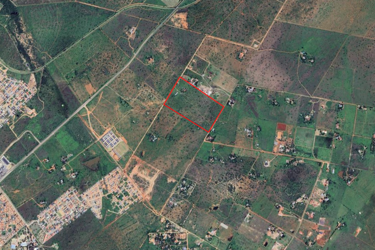 An aerial view of the small holding property, highlighting the land boundaries and surrounding rural landscape.