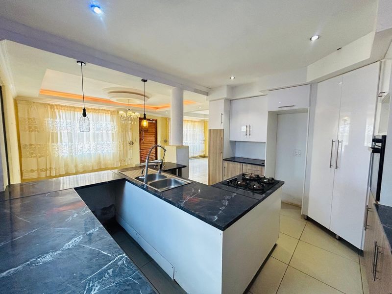 MODERN HOME IN MZOMBANA VILLAGE WITH BOREHOLE AND SEWER CONNECTION!! - Photo 4