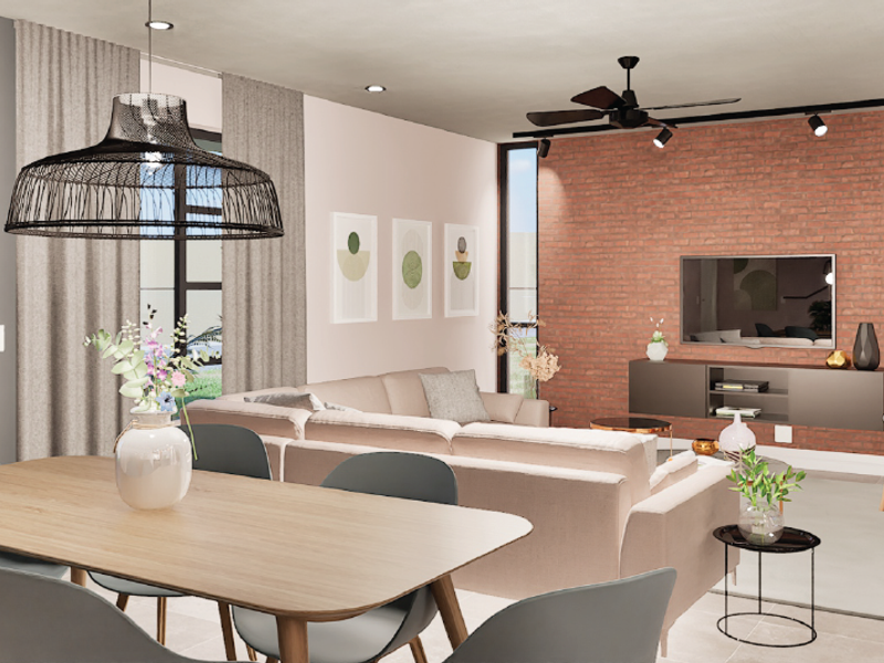 Modern open-plan living and dining area featuring an exposed brick feature wall, contemporary lighting, and large glass doors leading to the exterior.