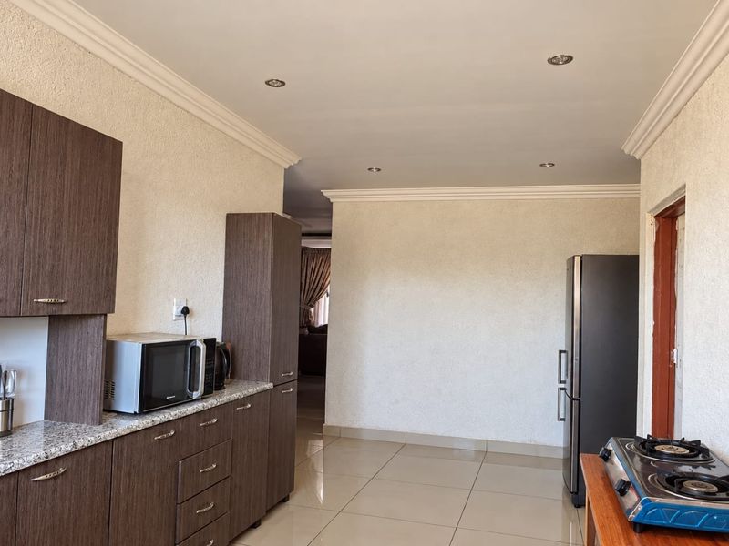 Beautiful 4-Bedroom Family Home on a Spacious Double Stand - Photo 9