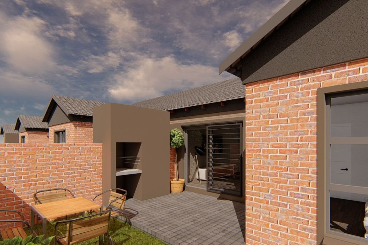 Rear exterior view of a townhouse featuring a paved patio, built-in braai, and brick facade with modern security shutters.