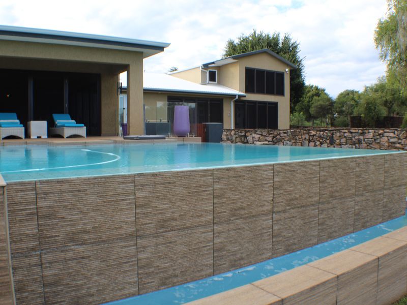 Sophisticated and stylish family home with river views, in secure and sought after estate. - Photo 2