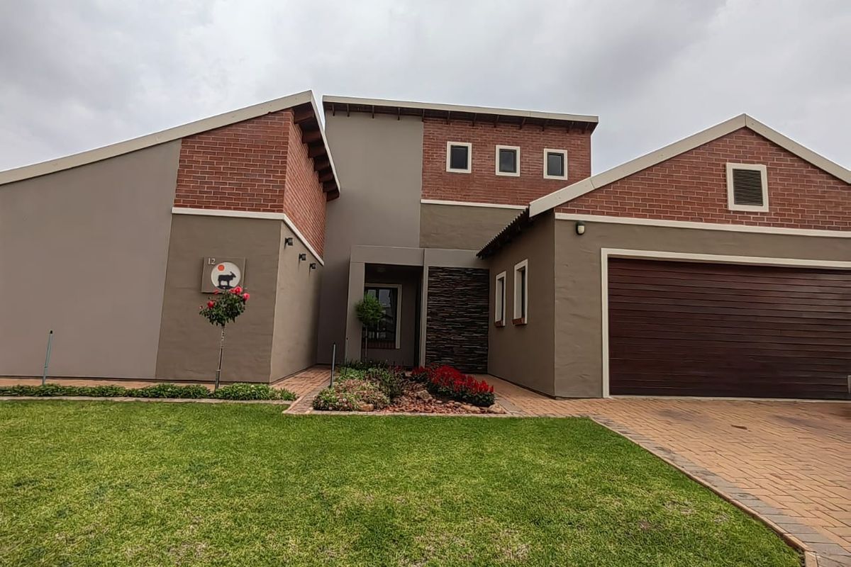 Spacious Home in a Secure Estate! - Photo 2