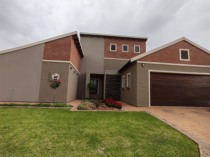 Spacious Home in a Secure Estate! - Photo 2