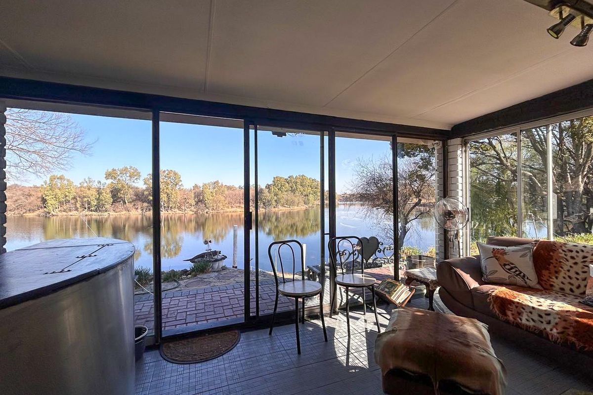 Riverside retreat invites you to embrace a lifestyle of tranquility and natural beauty - Photo 5