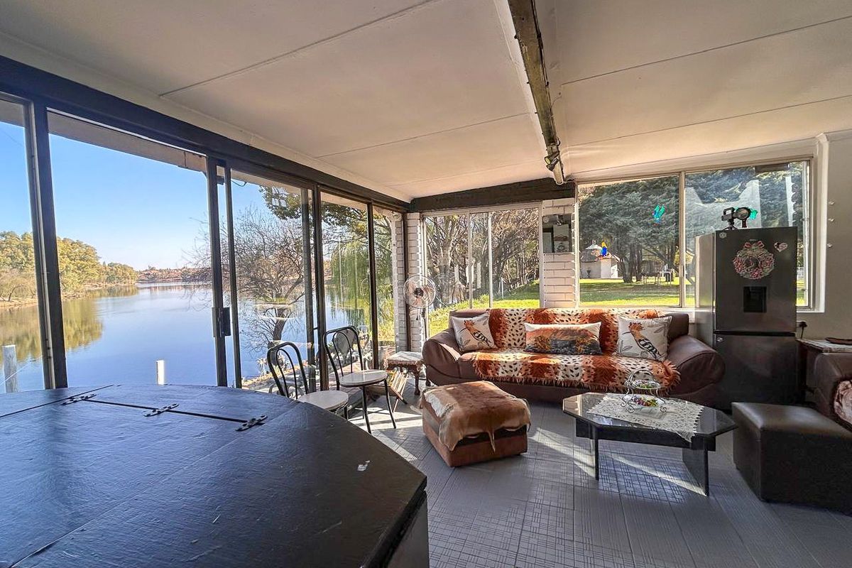 Riverside retreat invites you to embrace a lifestyle of tranquility and natural beauty - Photo 3