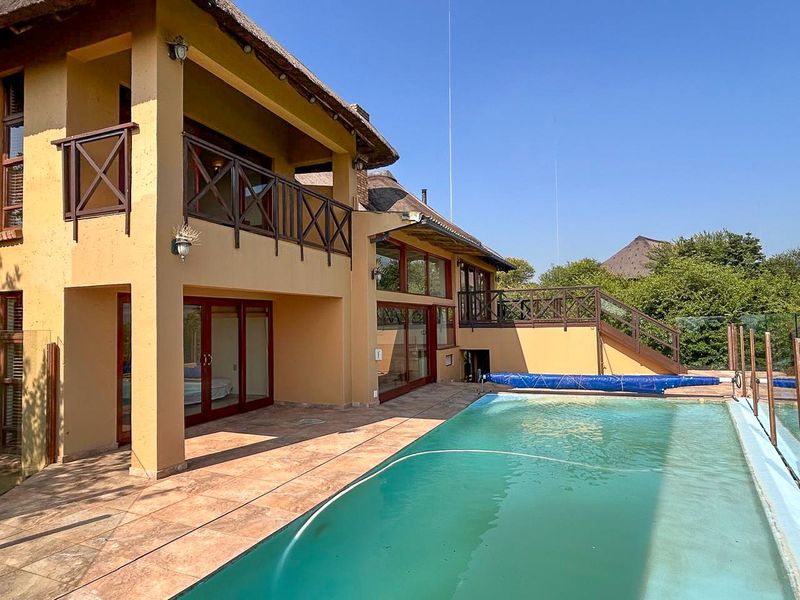 Experience Living Close to Nature in This Stunning Double-Storey Family Home - Photo 1