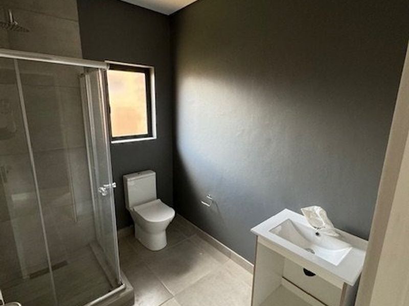 Elegant 3-Bedroom Home in a Secure Estate - Photo 9