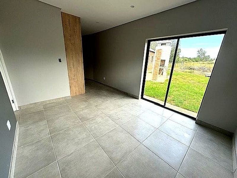 Elegant 3-Bedroom Home in a Secure Estate - Photo 7