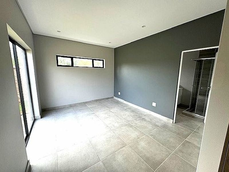 Elegant 3-Bedroom Home in a Secure Estate - Photo 10