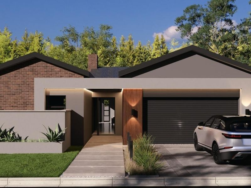 A modern single-story residential facade featuring a combination of brick and rendered finishes, a double garage, and a paved entrance walkway.