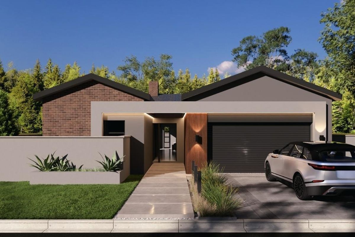 Modern single-story residential facade featuring a combination of brick and rendered finishes, integrated garage, and a landscaped front entrance.