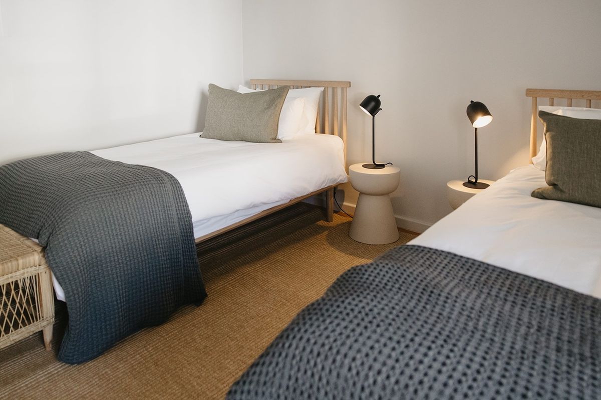 A well-presented bedroom featuring neutral walls and clean finishes, providing a comfortable and inviting sleeping space.