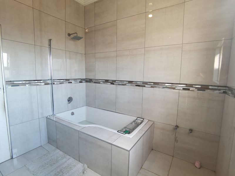 **Exclusive Mandate Opportunity in Tlhabane West! ** Discover this stunning **3-bedroom home** - Photo 9