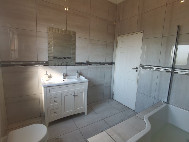 **Exclusive Mandate Opportunity in Tlhabane West! ** Discover this stunning **3-bedroom home** - Photo 8