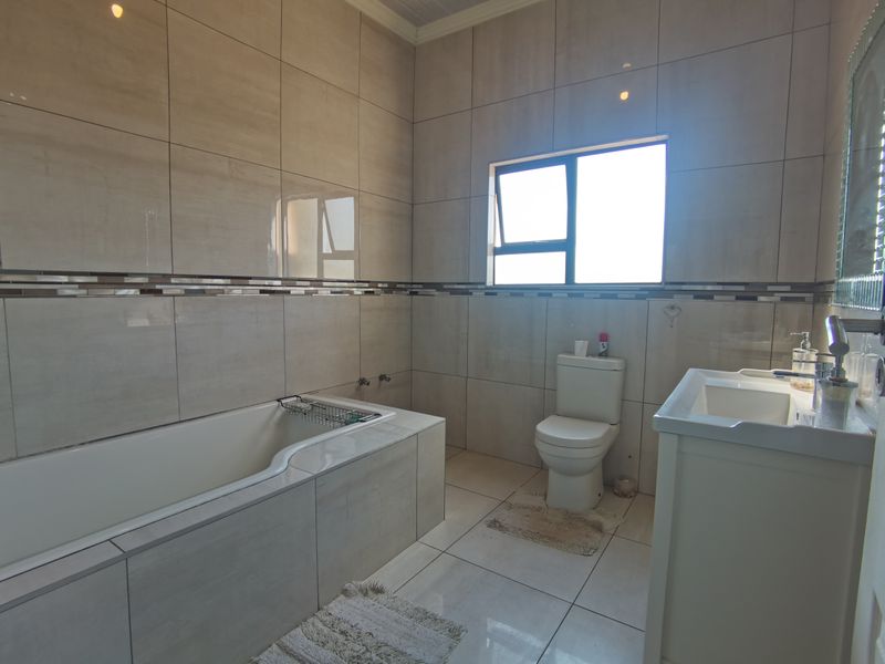 **Exclusive Mandate Opportunity in Tlhabane West! ** Discover this stunning **3-bedroom home** - Photo 7