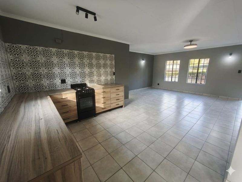 Modern, Newly Renovated 2-4 Bedroom Home with Added Peace of Mind! - Photo 4
