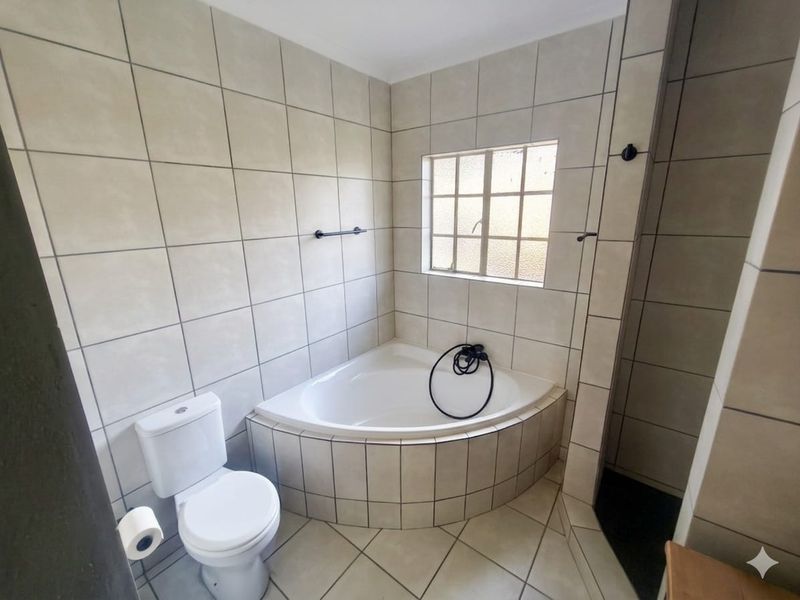 Modern, Newly Renovated 2-4 Bedroom Home with Added Peace of Mind! - Photo 10