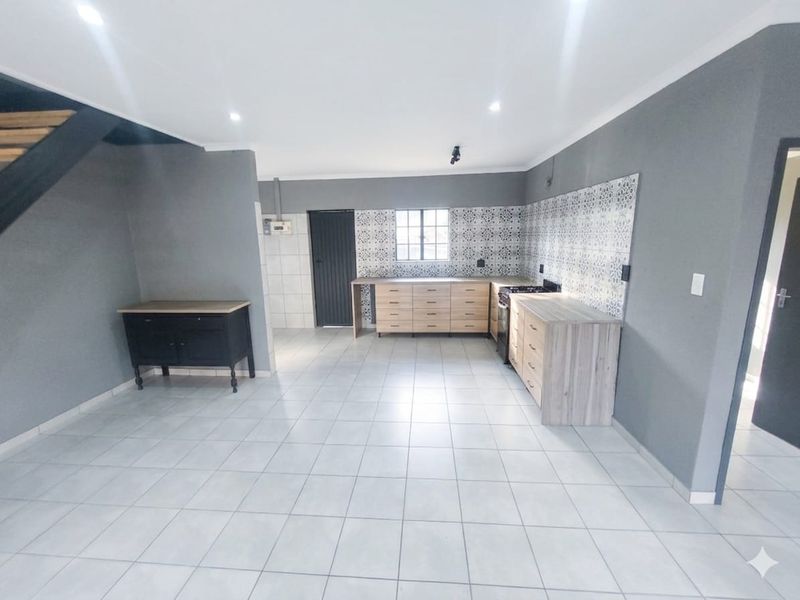 Modern, Newly Renovated 2-4 Bedroom Home with Added Peace of Mind! - Photo 7