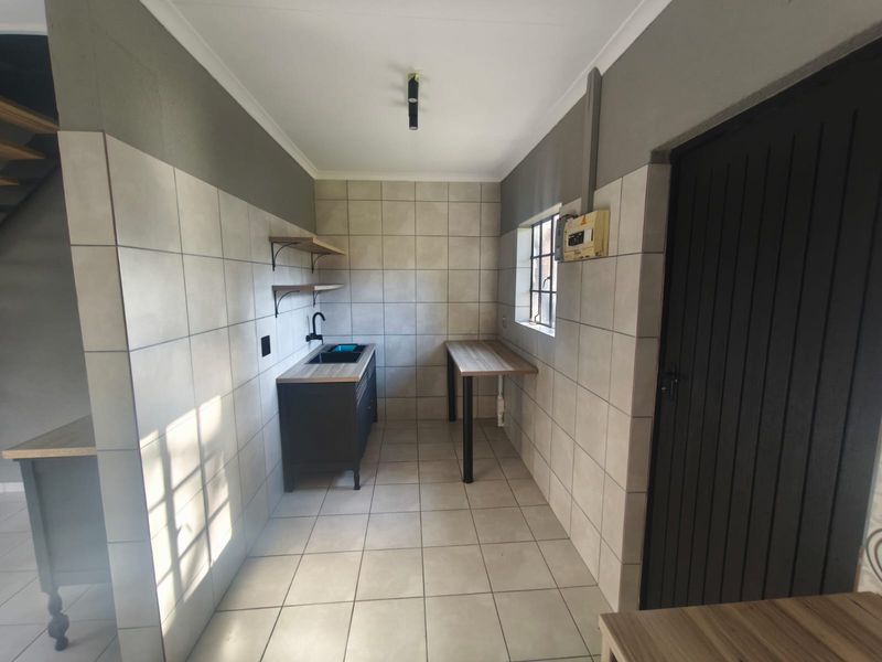 Modern, Newly Renovated 2-4 Bedroom Home with Added Peace of Mind! - Photo 6