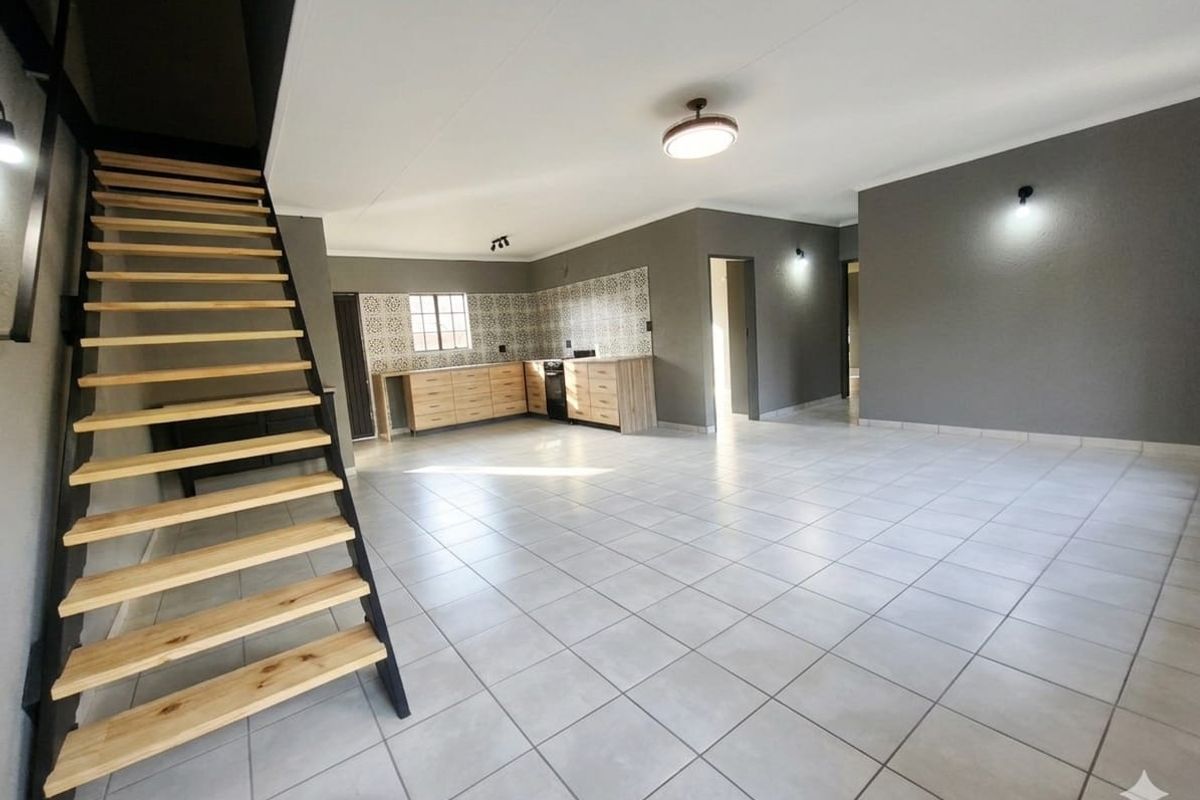Modern, Newly Renovated 2-4 Bedroom Home with Added Peace of Mind! - Photo 3