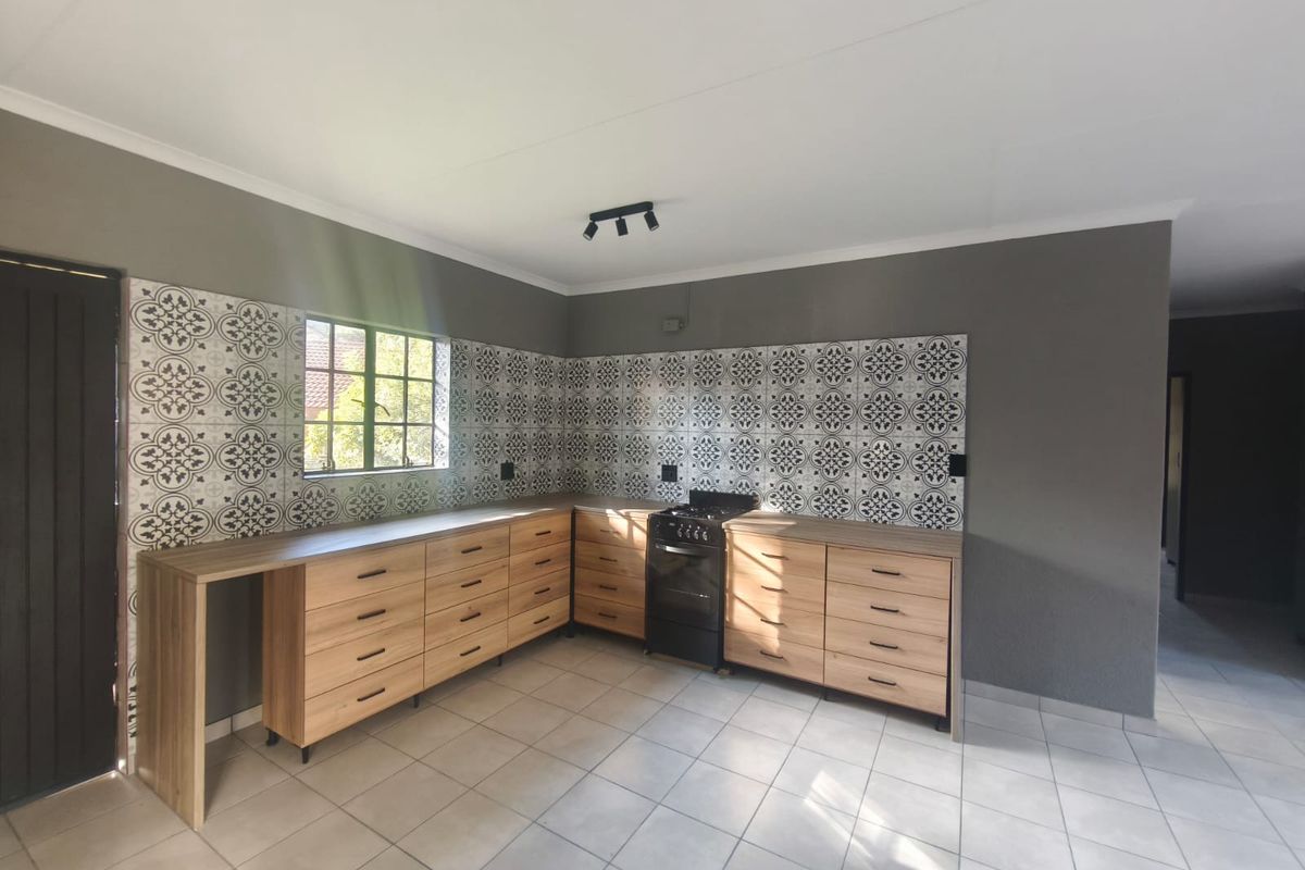 Modern, Newly Renovated 2-4 Bedroom Home with Added Peace of Mind! - Photo 5