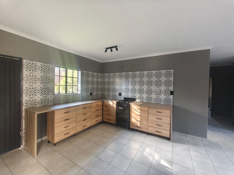 Modern, Newly Renovated 2-4 Bedroom Home with Added Peace of Mind! - Photo 5