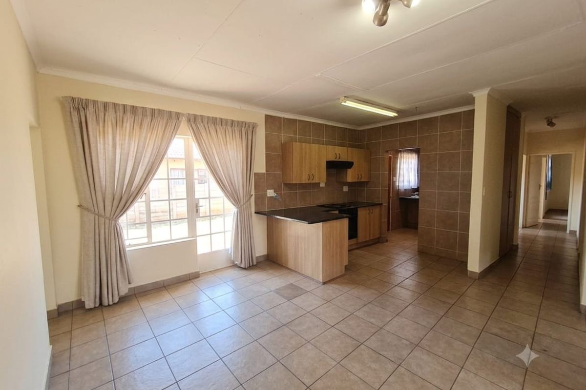 Charming 3-Bed Family Home with a Massive Wrap-Around Yard! - Photo 5