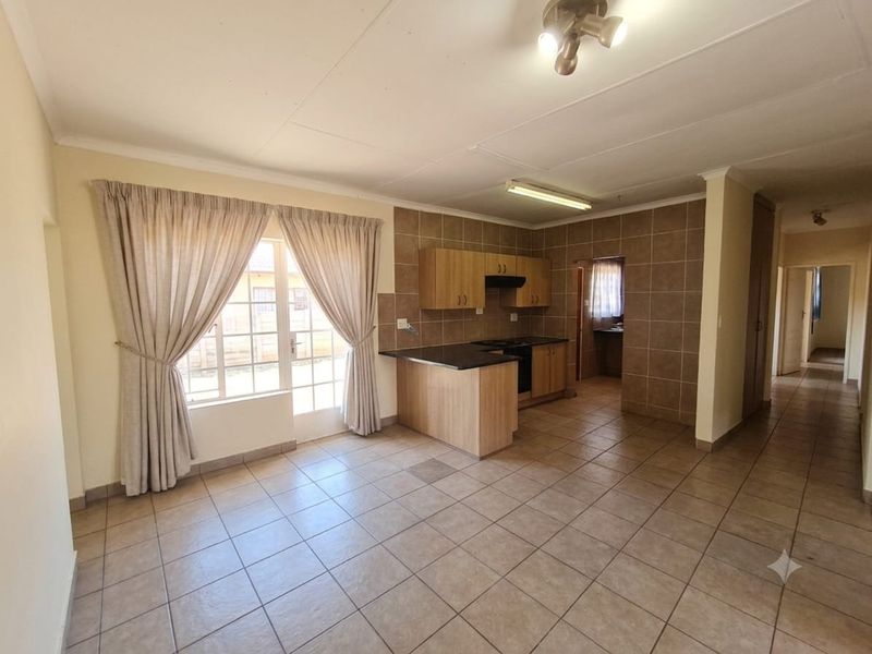 Charming 3-Bed Family Home with a Massive Wrap-Around Yard! - Photo 5