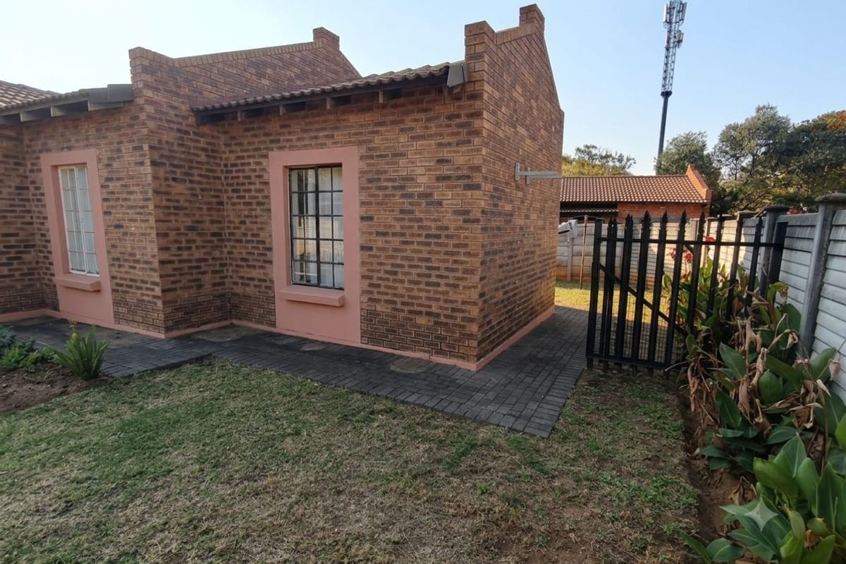 Charming 3-Bed Family Home with a Massive Wrap-Around Yard! - Photo 3
