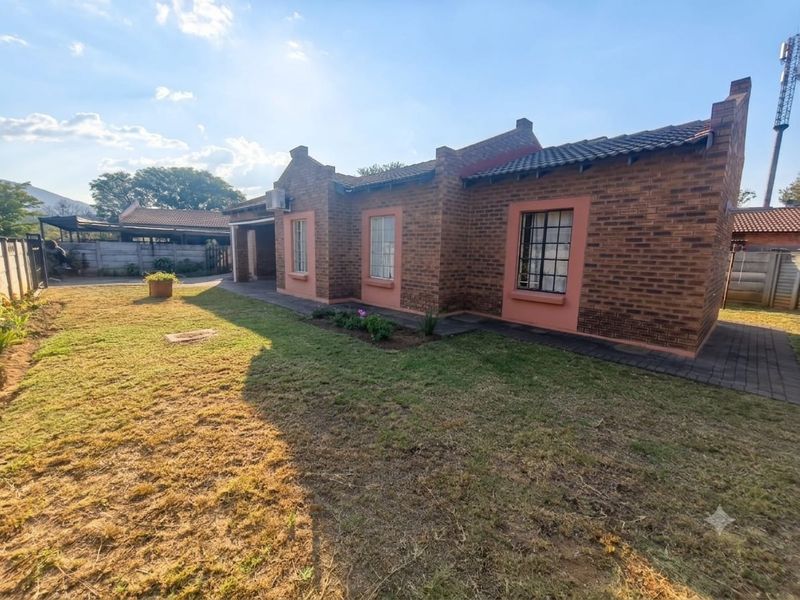 Charming 3-Bed Family Home with a Massive Wrap-Around Yard! - Photo 1