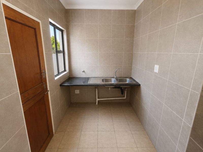 Charming 3-Bed Family Home with a Massive Wrap-Around Yard! - Photo 8