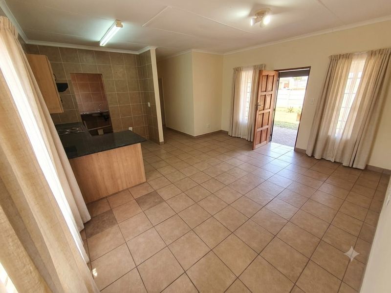 Charming 3-Bed Family Home with a Massive Wrap-Around Yard! - Photo 6