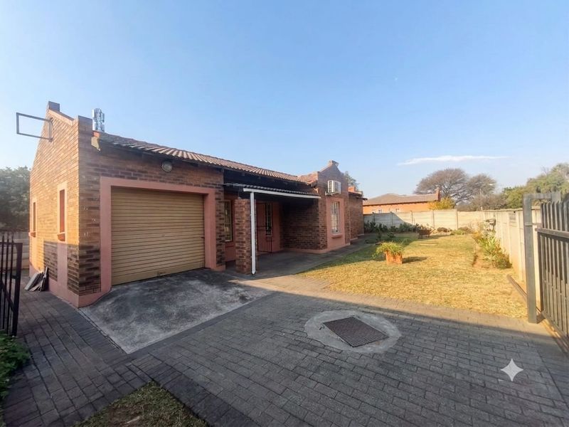 Charming 3-Bed Family Home with a Massive Wrap-Around Yard! - Photo 2