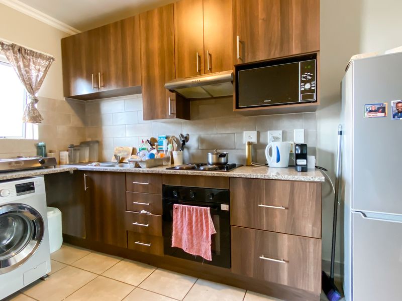 Stylish Family Home with 24/7 Security - Photo 3