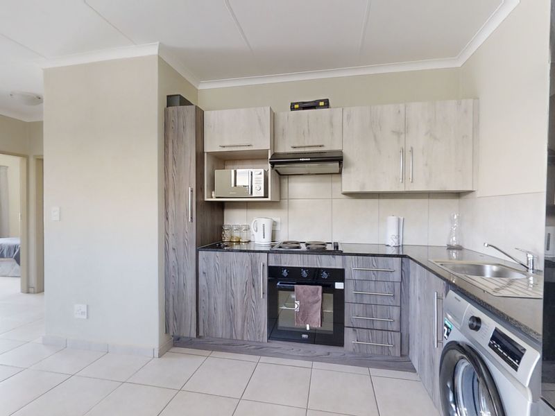 First Floor Unit in Modern Complex! - Photo 3