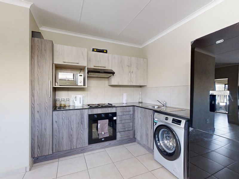 First Floor Unit in Modern Complex! - Photo 2