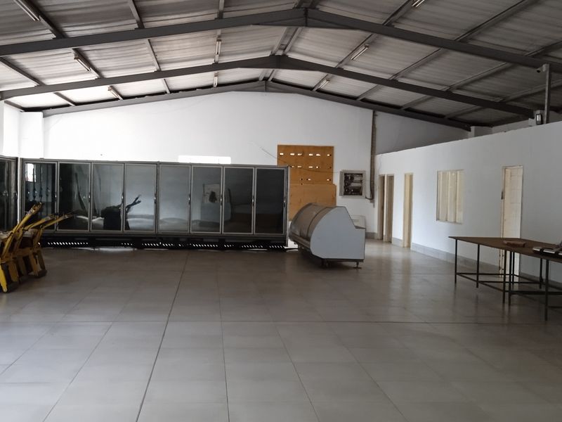Exceptional Business Warehouse: Includes Office Spaces, Farmhouse, and Land! - Photo 1