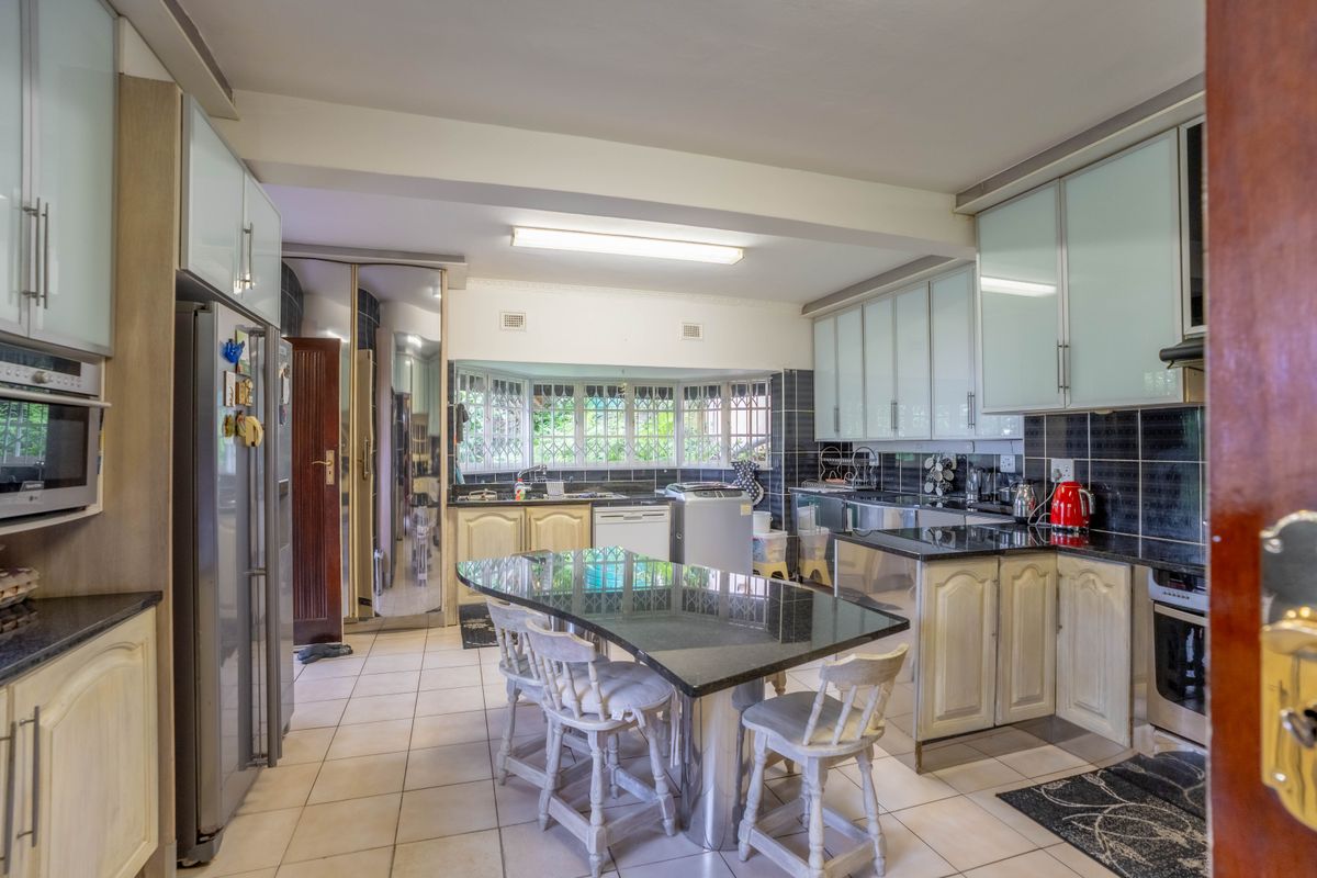 The epitome of modern living in this captivating family home! - Photo 5