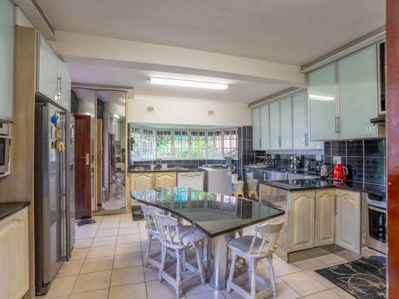 The epitome of modern living in this captivating family home! - Photo 5