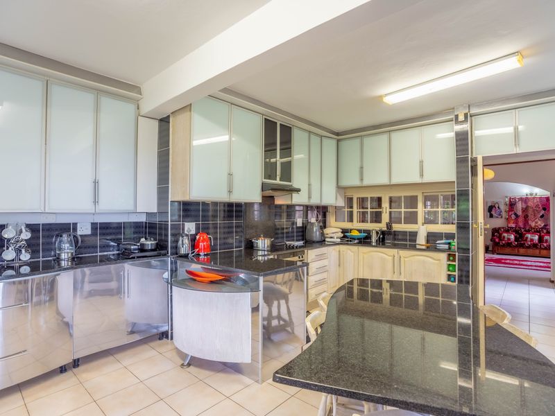 The epitome of modern living in this captivating family home! - Photo 9